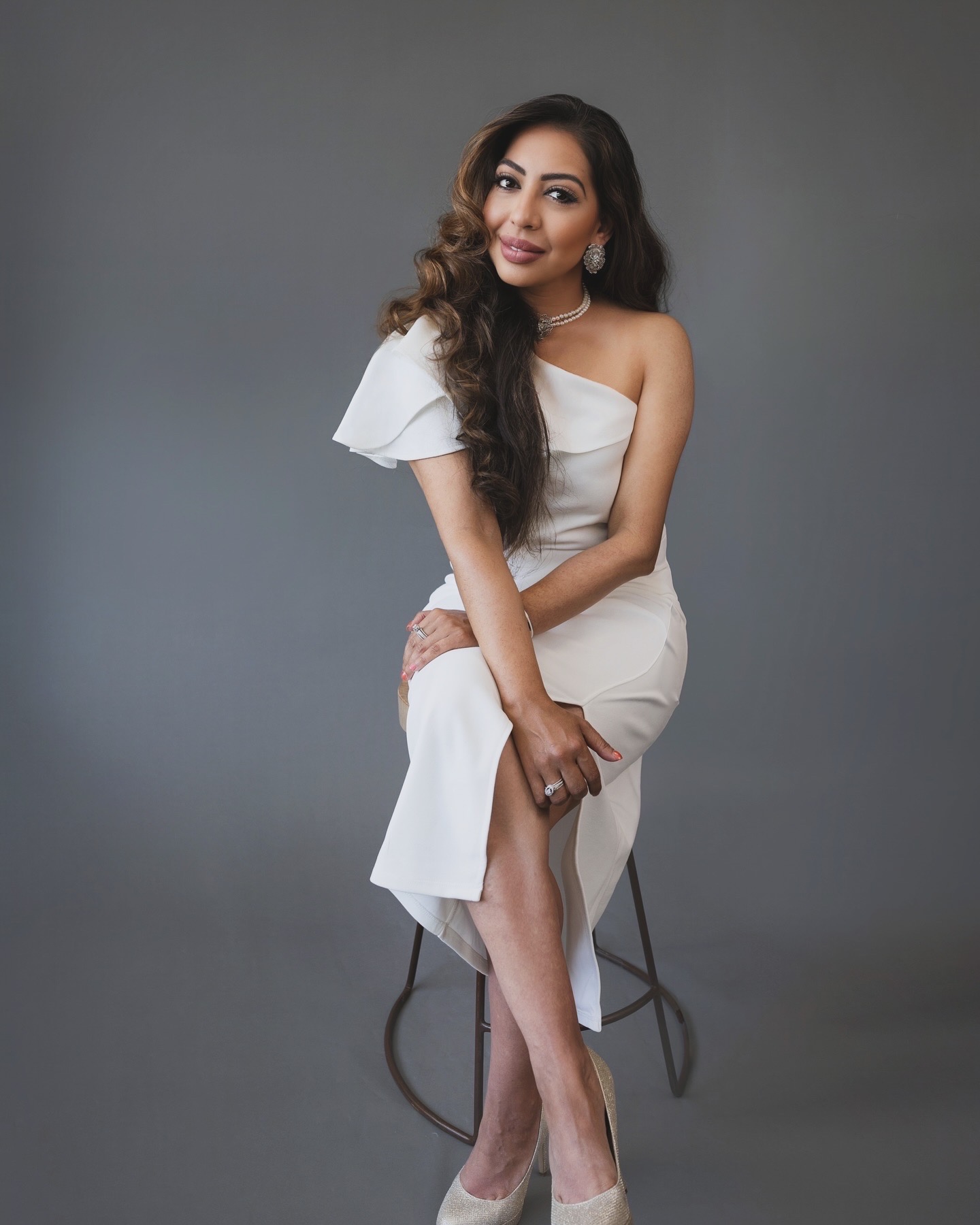Professional portrait of Maya Rehill, founder of The Circle We Never Had